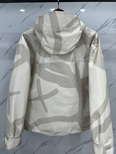The North Face x KAWS Mountain Jacket – Cream/Sand Print
